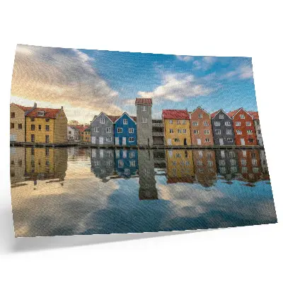 Poster colorful houses by the water with architectural reflections