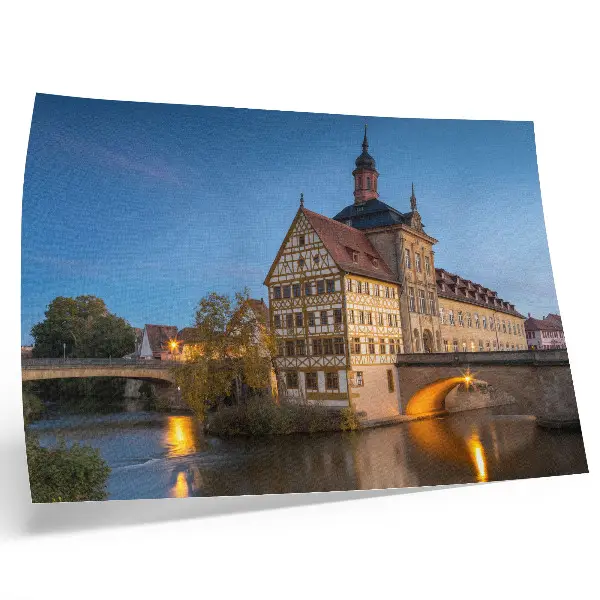Decorative canvas print historic building with a bridge, water, and blue sky