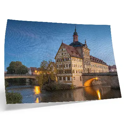 Decorative canvas print historic building with a bridge, water, and blue sky