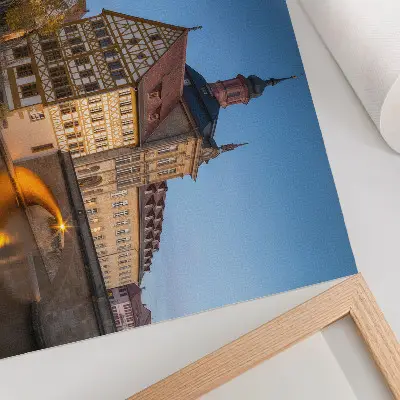 Decorative canvas print historic building with a bridge, water, and blue sky