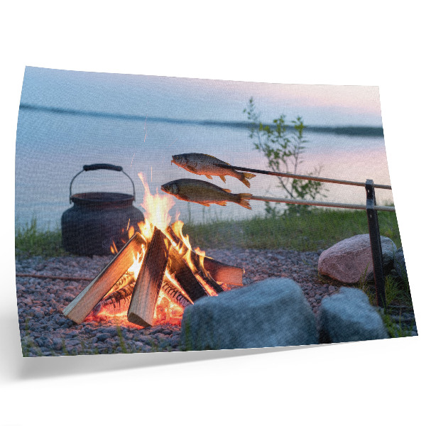 Decorative canvas print Bonfire by the lake, fish on sticks, naturally