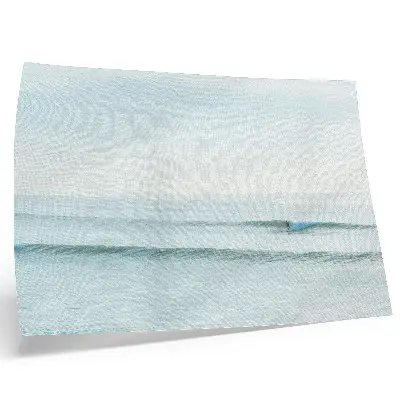 Decorative canvas print featuring a minimalist ocean waves surfer design