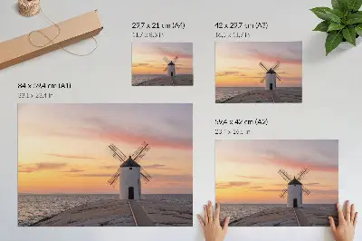 Poster windmill in the sunset light with a pastel sea sky