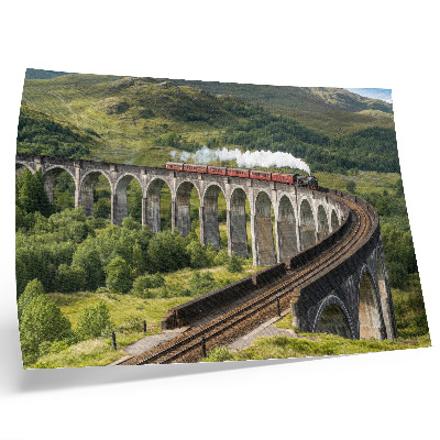Photo canvas A viaduct with a train among green hills