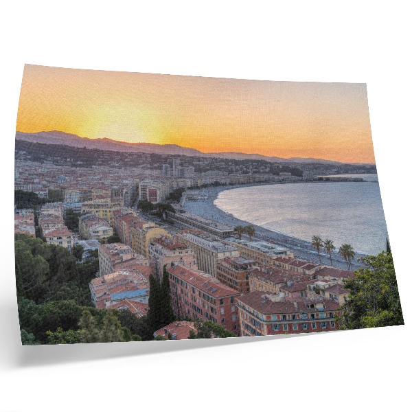 Photo canvas View of the city at sunset over the sea