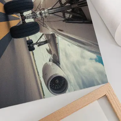 Photo canvas airplane landing gear under a dynamic sky