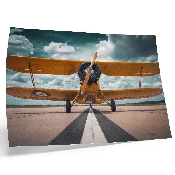 Decorative canvas print airplane on runway under a dynamic sky