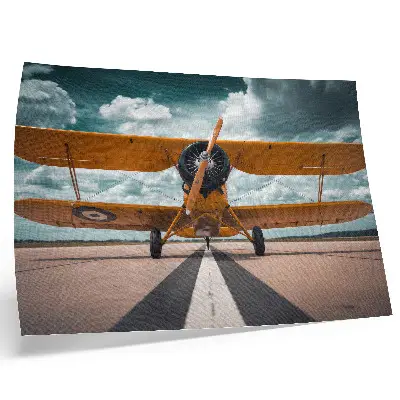 Decorative canvas print airplane on runway under a dynamic sky