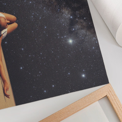 Decorative canvas print A figure under a starry sky looks surreal