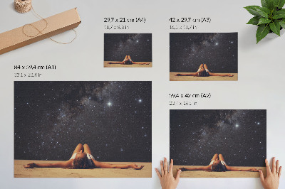 Decorative canvas print A figure under a starry sky looks surreal