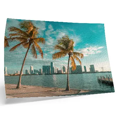 Photo canvas featuring palm trees by a calm lake with skyscrapers under a turquoise sky