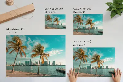 Photo canvas featuring palm trees by a calm lake with skyscrapers under a turquoise sky