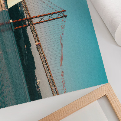 Photo canvas A bridge and sailboats over the water in pastel tones