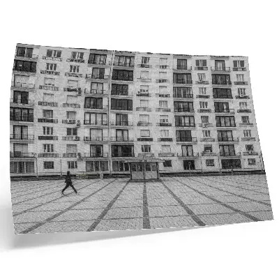 Modern building with balconies and a square poster 
