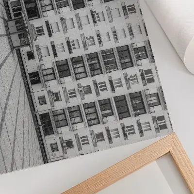 Modern building with balconies and a square poster 