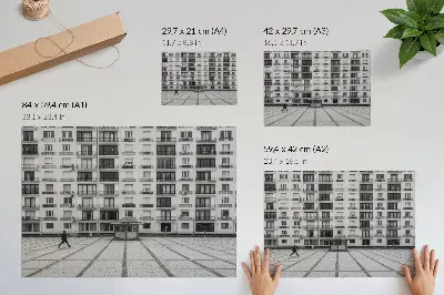 Modern building with balconies and a square poster 