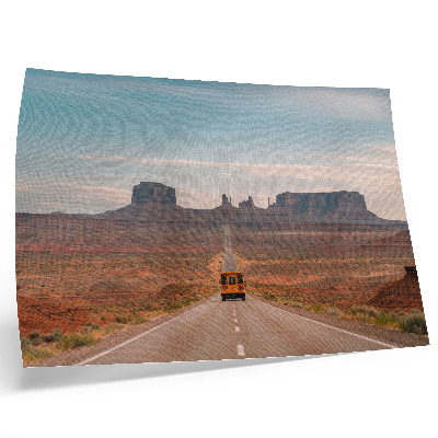 Decorative canvas print A straight road, monumental mountains, warm colors