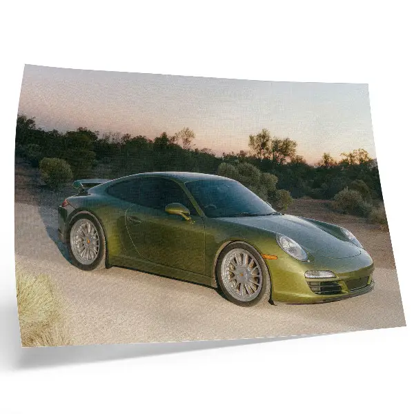 Photo canvas sports car in the desert at sunset