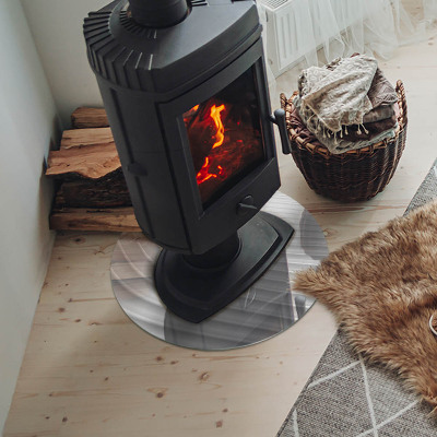 Glass hearth for stove round Waves of delicate lines