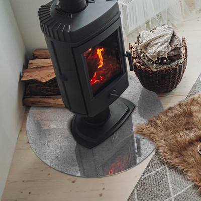 Glass hearth for stove round Raw concrete texture