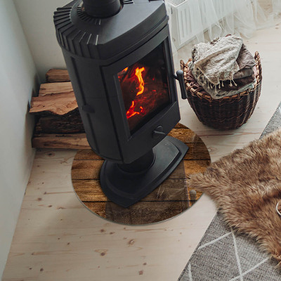 Glass fire hearth round Wooden board with grain