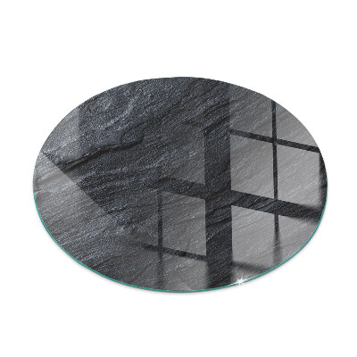 Glass hearth for stove round Stone surface texture
