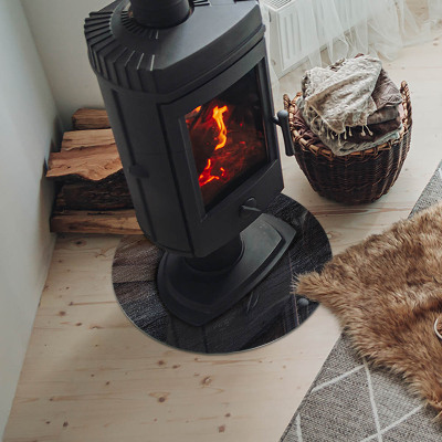 Glass hearth for stove round Stone surface texture