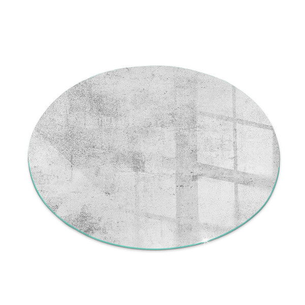 Glass hearth for stove round Raw concrete texture