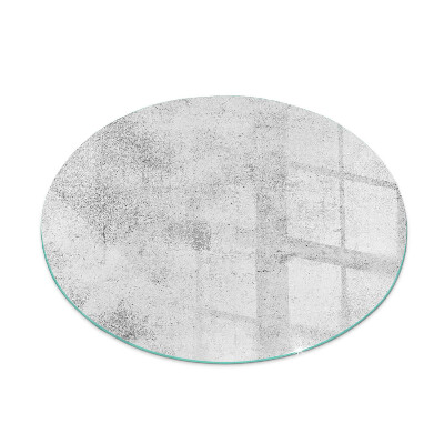 Glass hearth for stove round Raw concrete texture