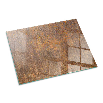 Glass hearth for wood stove rectangular Rust texture on the background