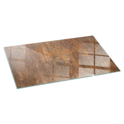 Glass hearth for wood stove rectangular Rust texture on the background