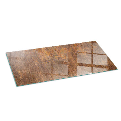 Glass hearth for wood stove rectangular Rust texture on the background