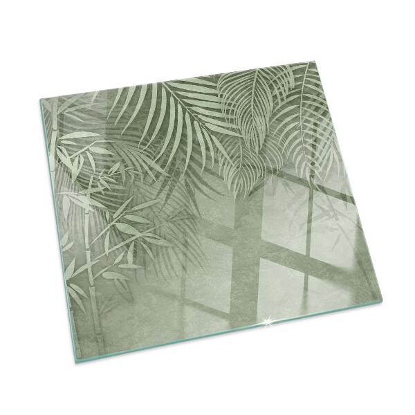 Glass hearth for wood stove rectangular Tropical leaves in the background