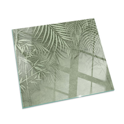 Glass hearth for wood stove rectangular Tropical leaves in the background