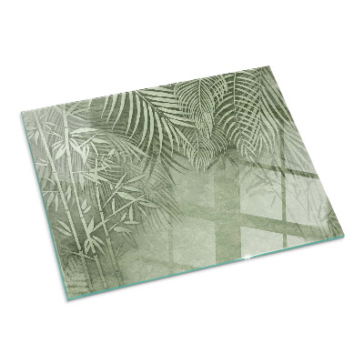 Glass hearth for wood stove rectangular Tropical leaves in the background