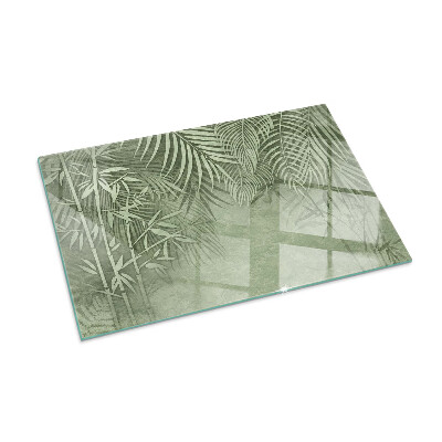 Glass hearth for wood stove rectangular Tropical leaves in the background