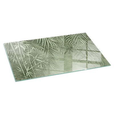 Glass hearth for wood stove rectangular Tropical leaves in the background