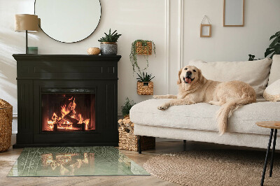 Glass hearth for wood stove rectangular Tropical leaves in the background