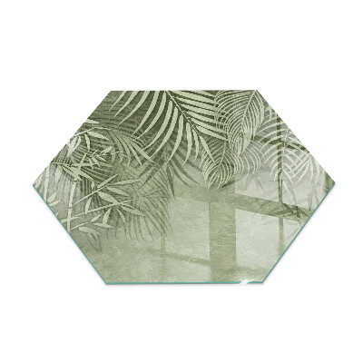 Glass hearth plate hexagonal Tropical leaves on the background