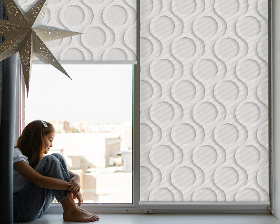 Fabric roller blind A wheel within a wheel