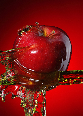 Fabric roller blind An apple doused with water