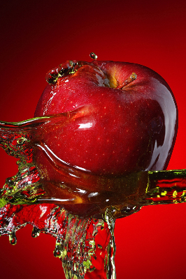 Fabric roller blind An apple doused with water