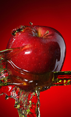 Fabric roller blind An apple doused with water
