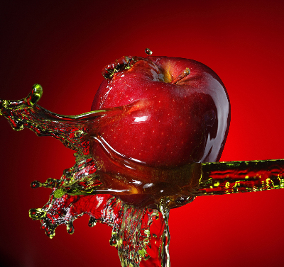 Fabric roller blind An apple doused with water