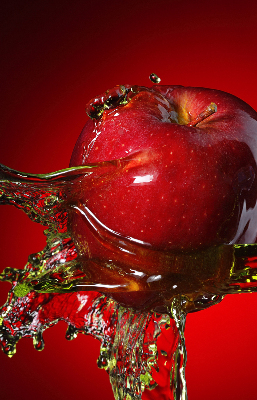 Fabric roller blind An apple doused with water