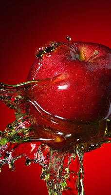 Fabric roller blind An apple doused with water