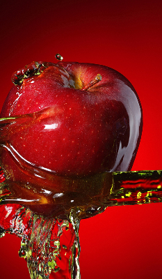 Fabric roller blind An apple doused with water