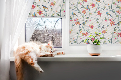 Fabric roller blind for window A bird on a branch