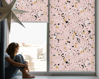 Fabric roller blind for window Paint stains on a pink background