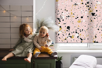 Fabric roller blind for window Paint stains on a pink background